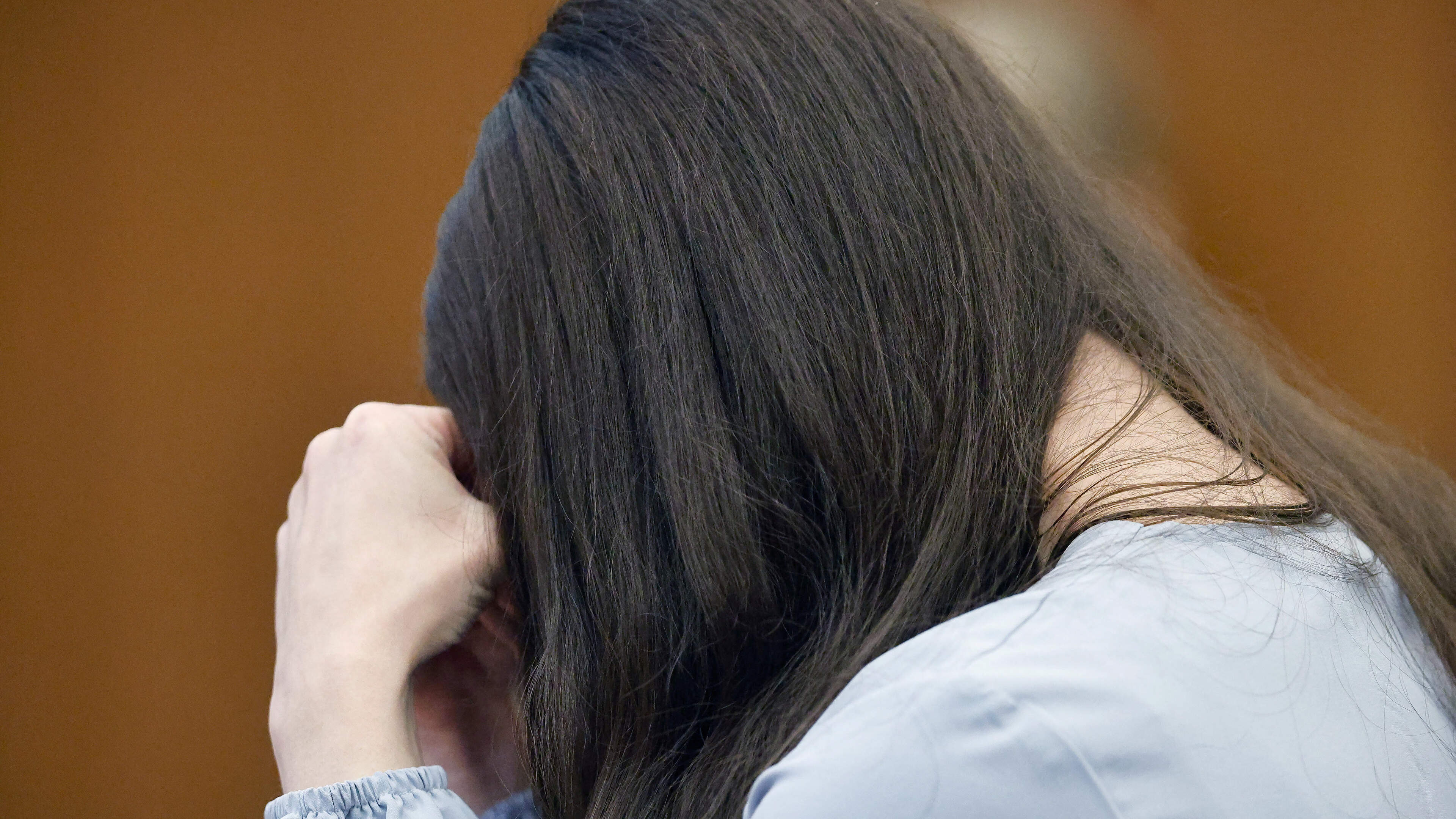 Woman in court charged with intimidating jurors in Lindsay Clancy case by allegedly filming them